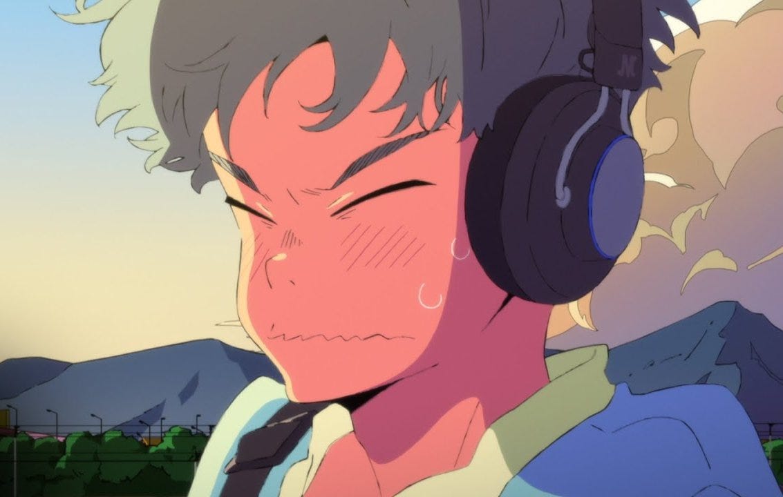 Cherry blushing, making his whole face red. There are mountaisn and clouds on the background