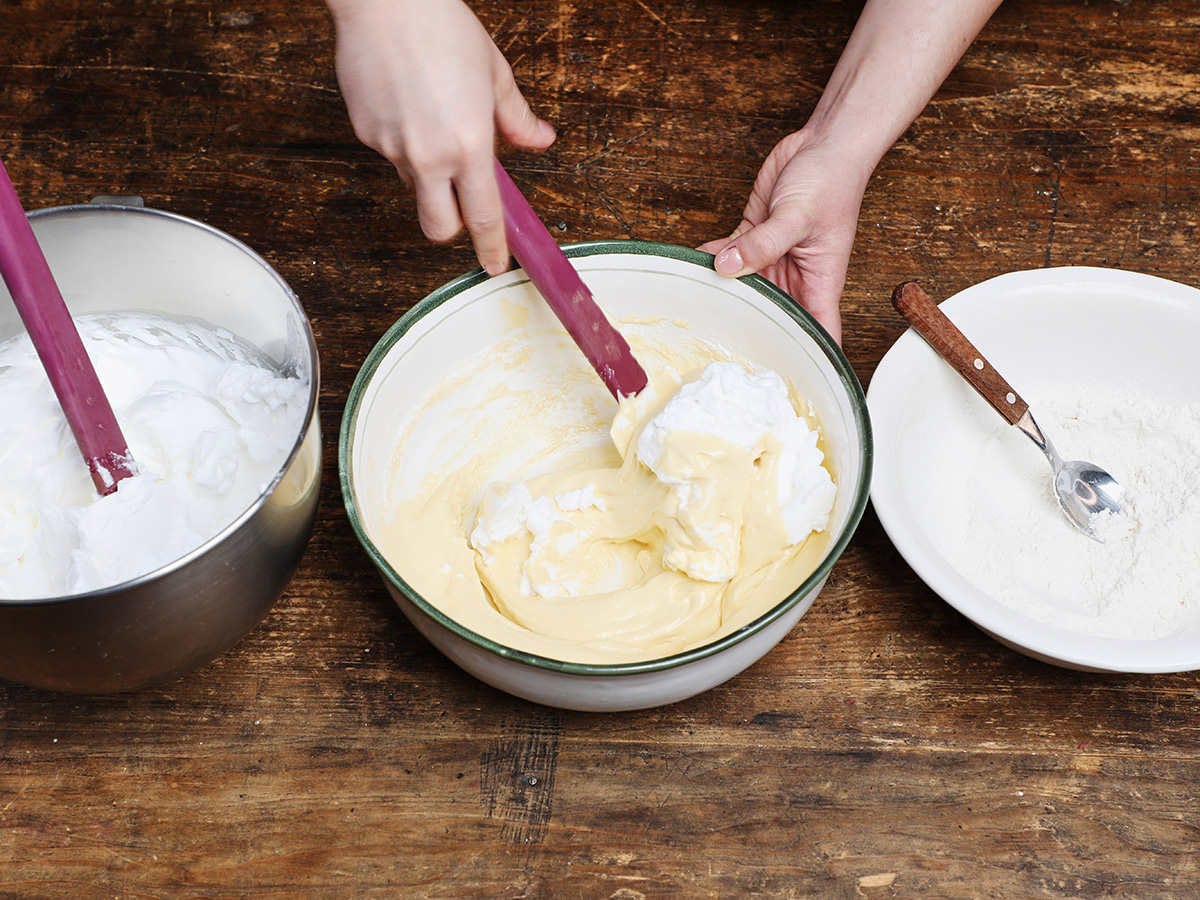 Stirring Tres Leches Cake Mix