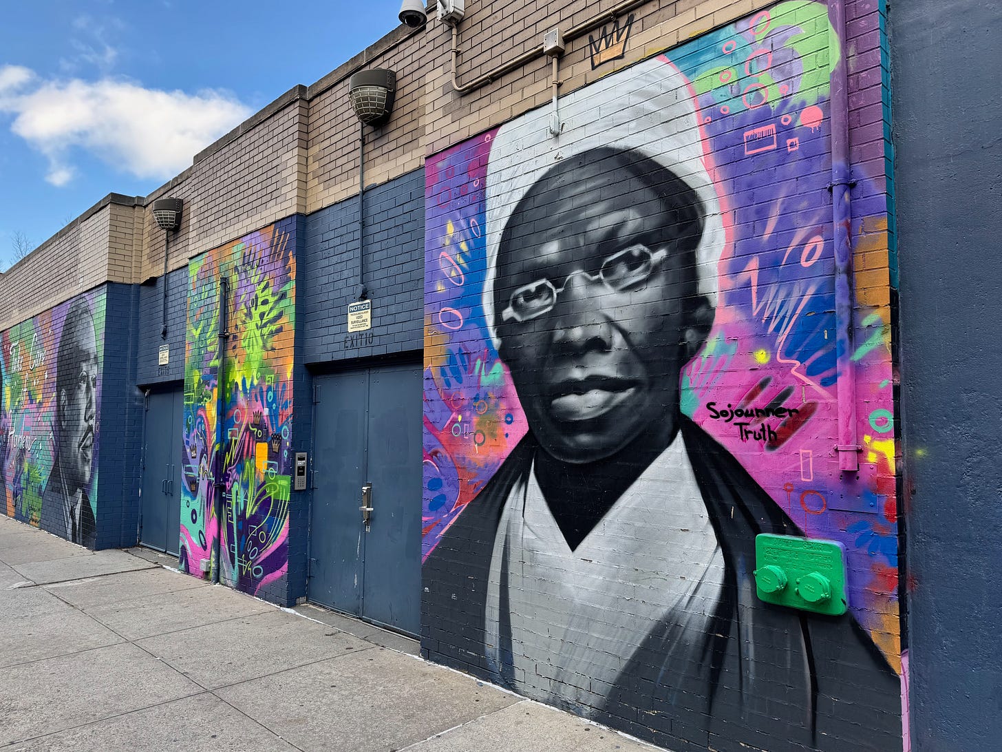New York, NY USA - January 3, 2025 : "Take care of Harlem" mural with a portrait Sojourner Truth and Langston Hughes on the wall of PS 149 in Harlem, New York City