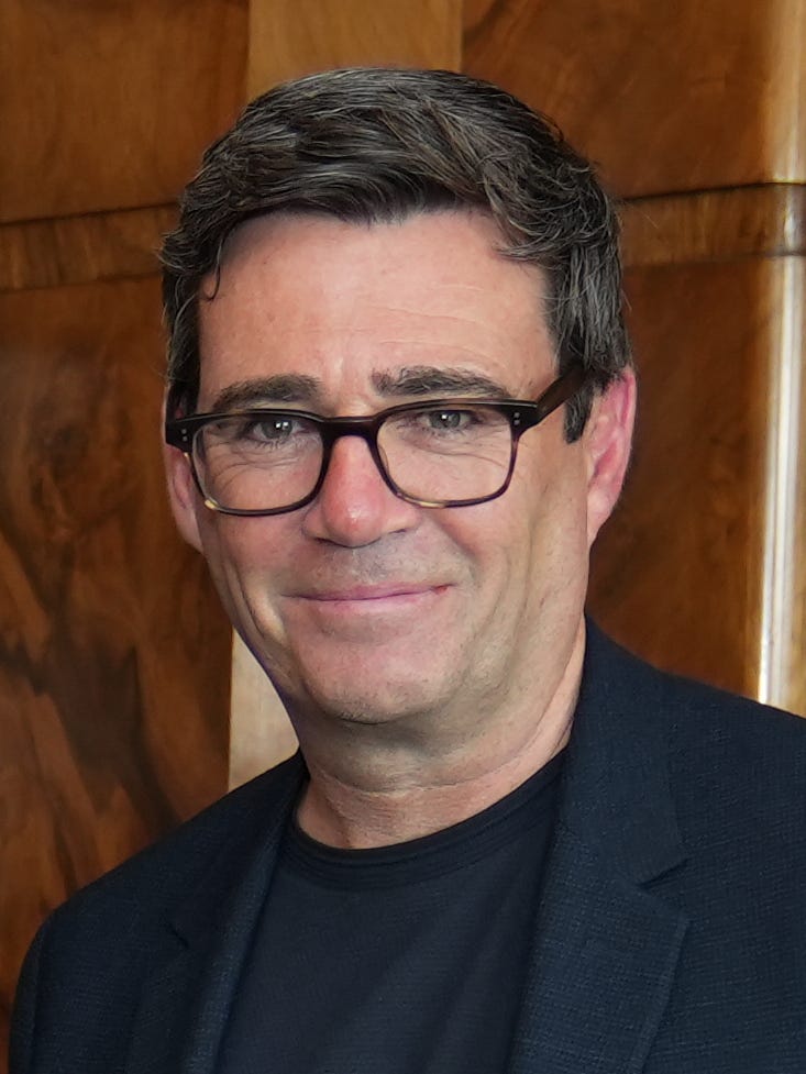 Head shot of Burnham smiling at the age of 54