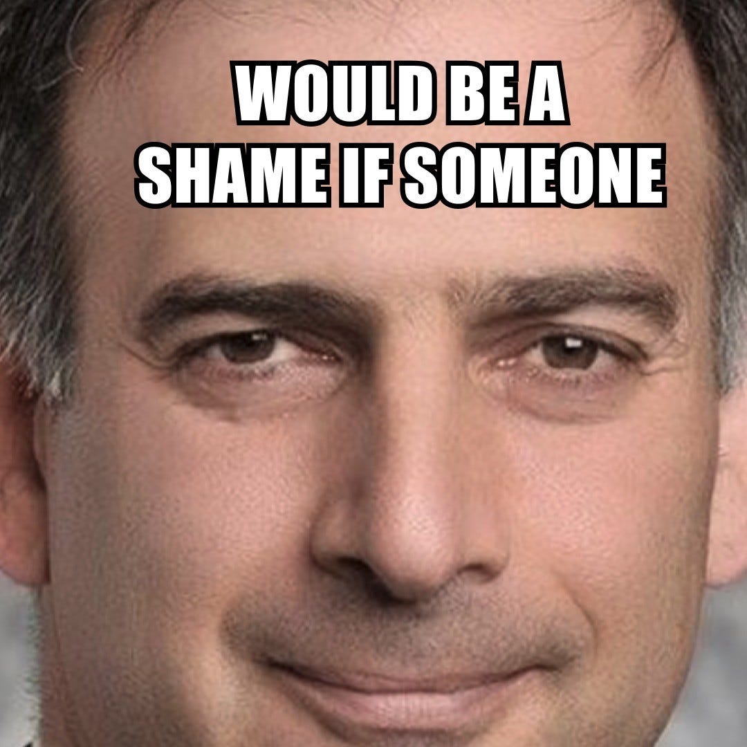 A closer crop of the same smiling man, captioned "Would be a shame if someone".