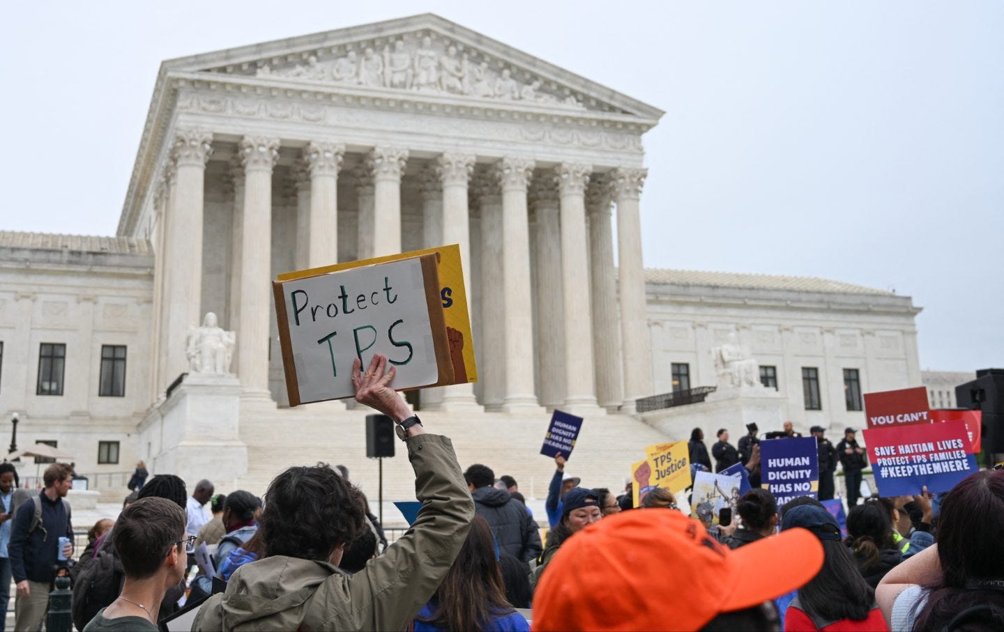 Members of the National TPS Alliance rally at the US Supreme Court in Washington, DC, on April 29, 2026. Members of the National TPS Alliance rally at the US Supreme Court in Washington, DC, on April 29, 2026.
