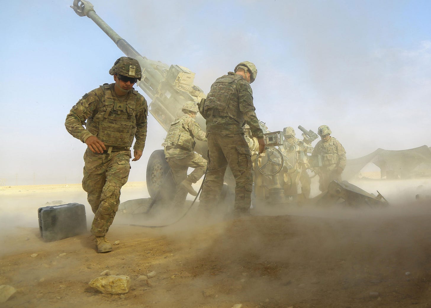 U.S. Army soldiers fire an M777 howitzer during Operation Desert Lion in support of Iraqi forces.