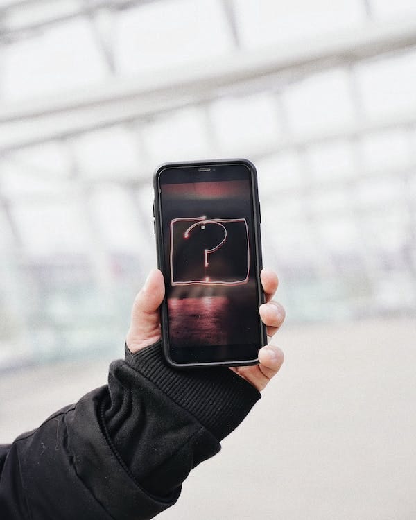 Free Person Holding Black Iphone Stock Photo Free Person Holding Black Iphone Stock Photo