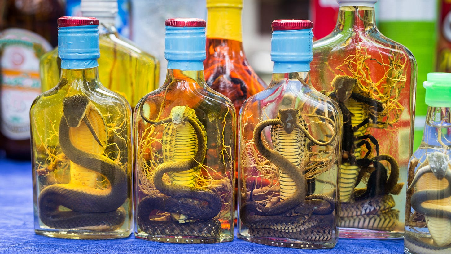 The Snake Infused Whiskey That's Not For The Faint Of Heart The Snake Infused Whiskey That's Not For The Faint Of Heart