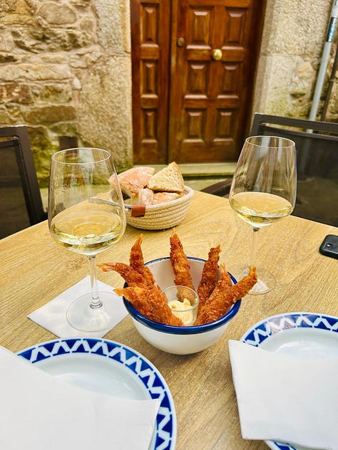 A photo gallery of A Coruña, Spain and Santiago de Compostello, with cathedrals, the Tower of Hercules, and some appetizing seafood