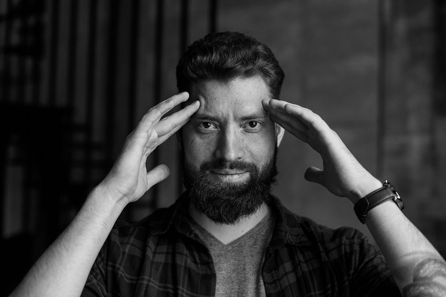 A professional portrait of Konstantin Kunakh, psychologist and author of the digest.