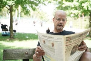 John Mitchell reading newspaper in a Philadelphia park John Mitchell reading newspaper in a Philadelphia park