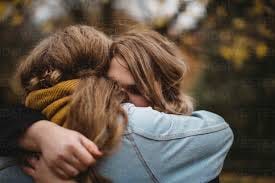 Women hugging stock photo Women hugging stock photo