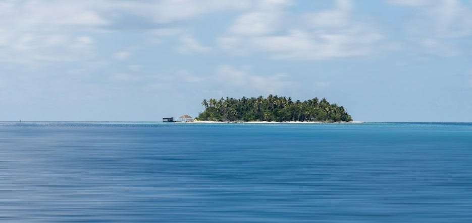 a small island in the middle of the ocean