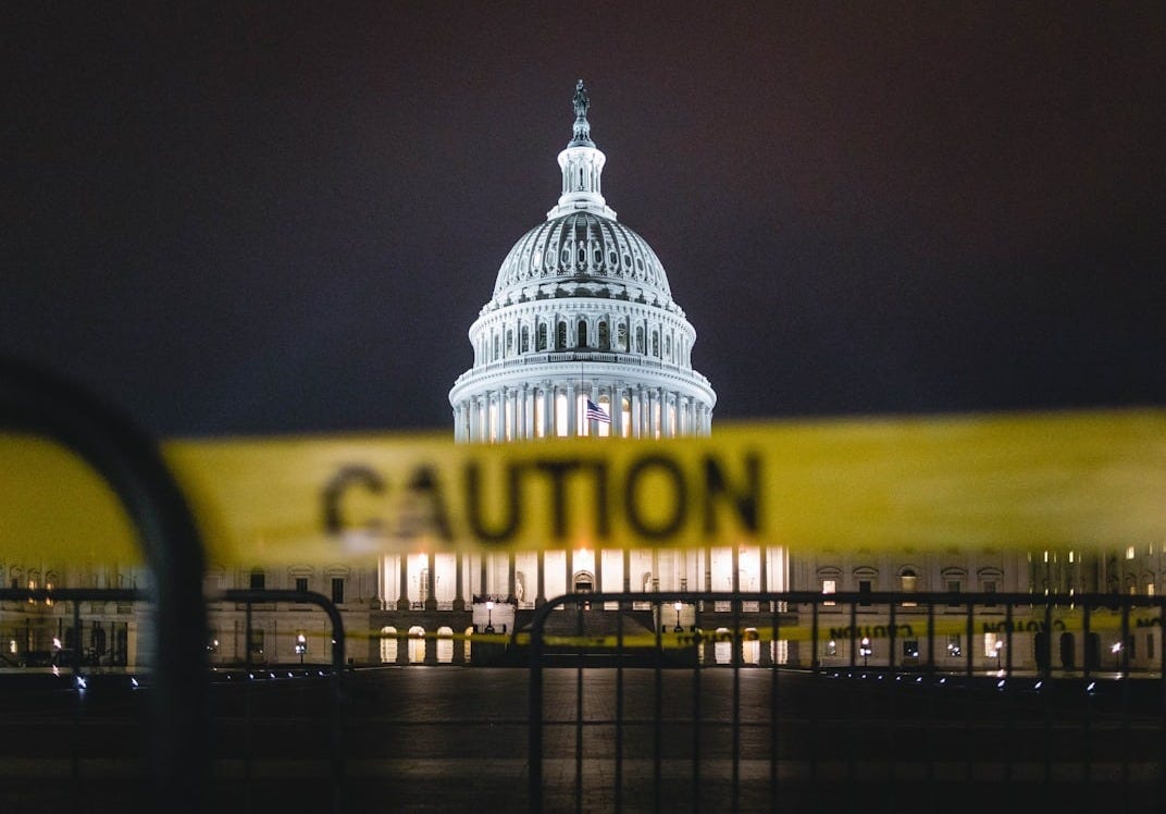 white concrete building at nighttime white concrete building at nighttime