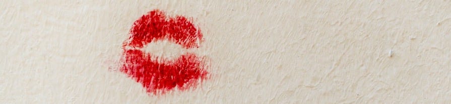 red stain on white wall