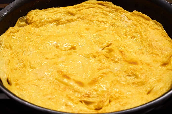 omelette cooking in pan