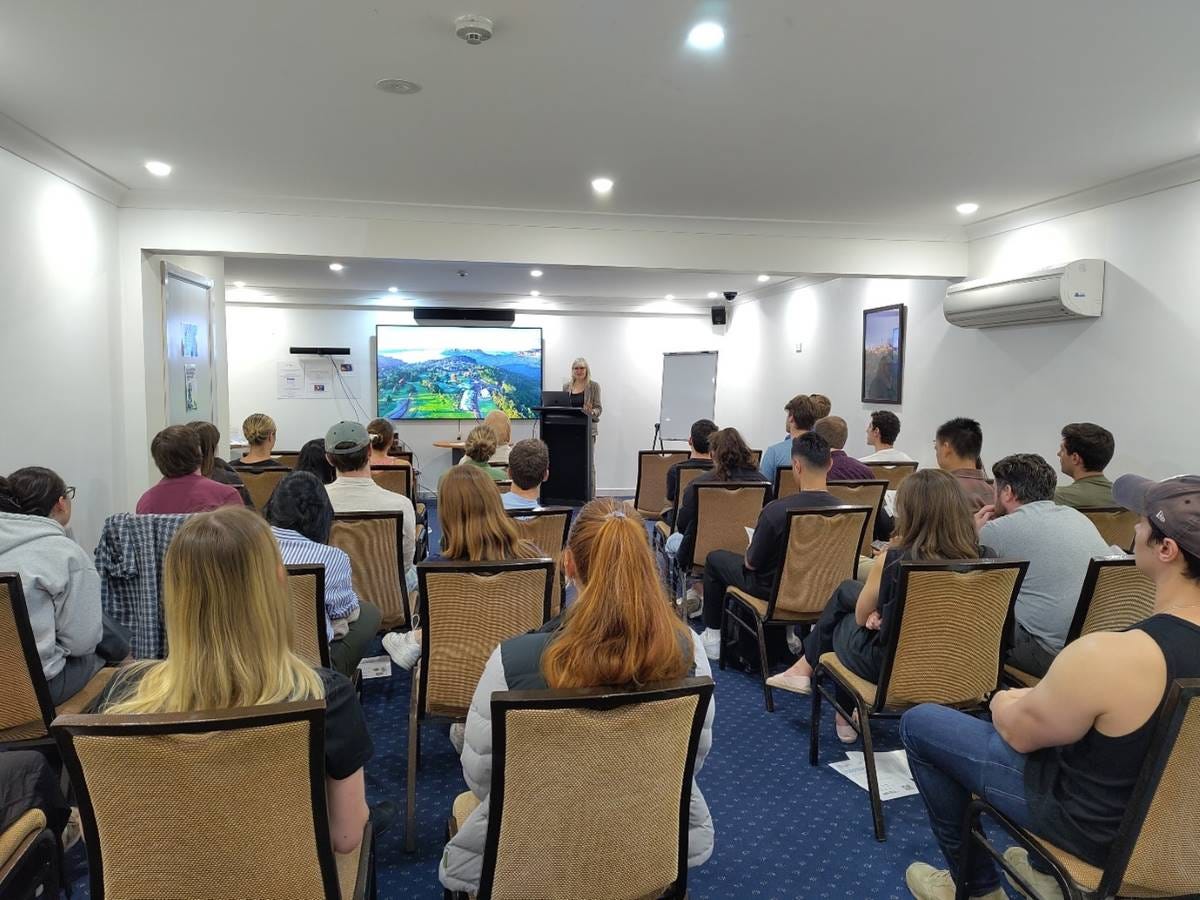 Lis Bastian from the Planetary Health Initiative speaking to one of four groups of students. Lis Bastian from the Planetary Health Initiative speaking to one of four groups of students.