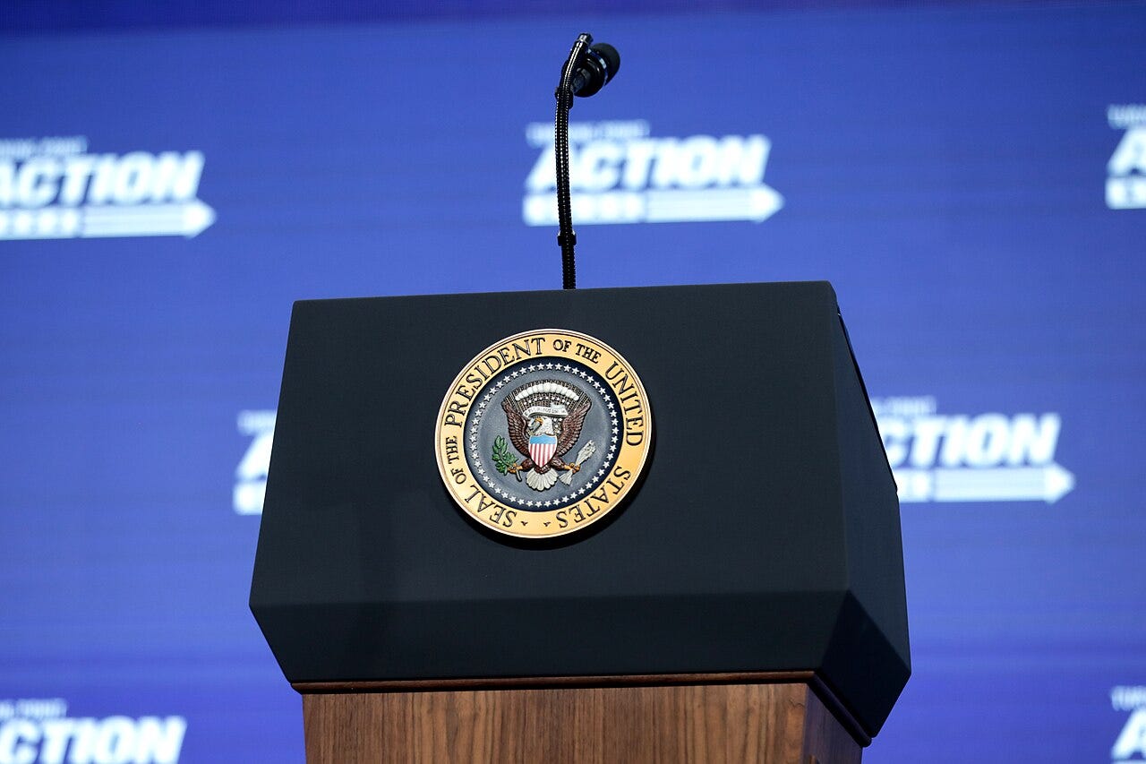 Photo: Gage Skidmore from Surprise, AZ, United States of America / Wikimedia Commons (CC BY-SA 2.0) The Presidential podium at an "An Address to Young Americans" event, featuring President Donald Trump, hosted by Students for Trump and Turning Point Action at Dream City Church in Phoenix, Arizona. Please attribute to Gage Skidmore if used elsewhere