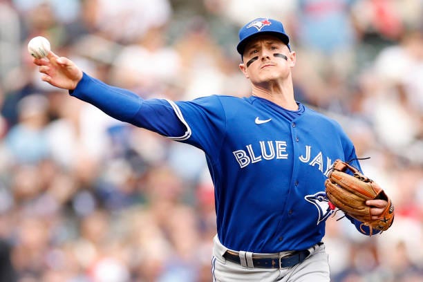 Matt Chapman of the Toronto Blue Jays throws to first base on a ball hit by Max Kepler of the Minnesota Twins during the second inning in Game Two of...