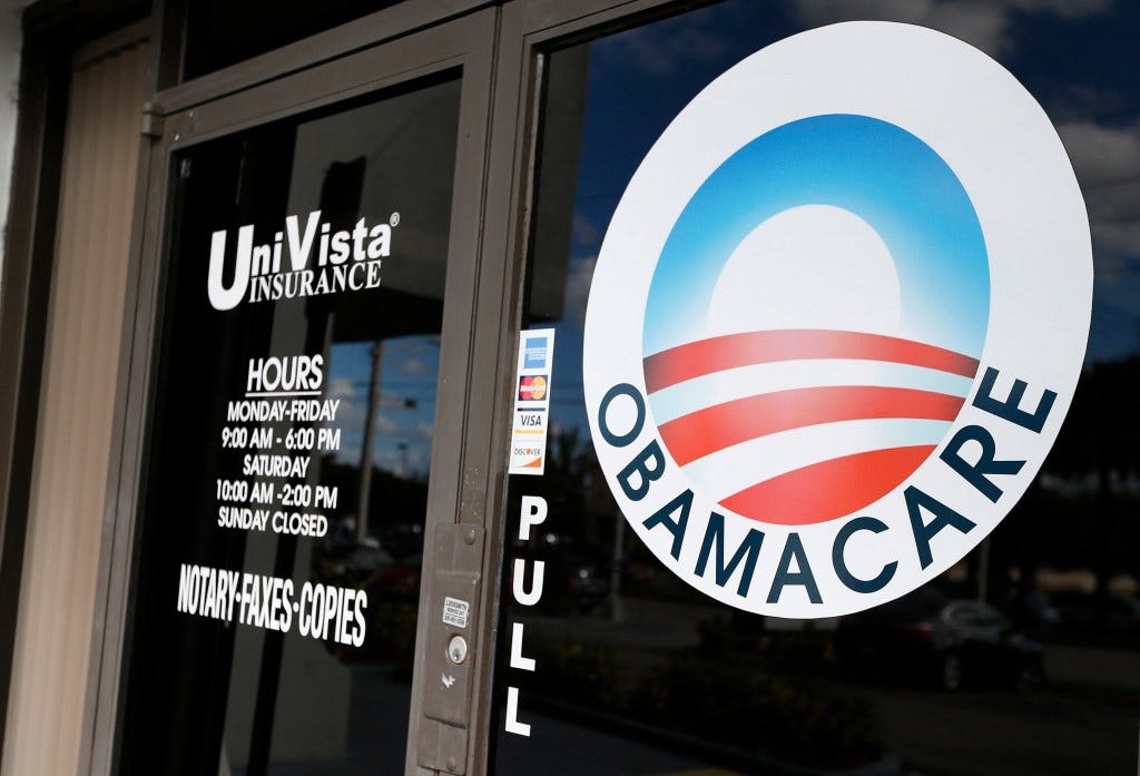Obamacare logo on the door of UniVista Insurance agency.