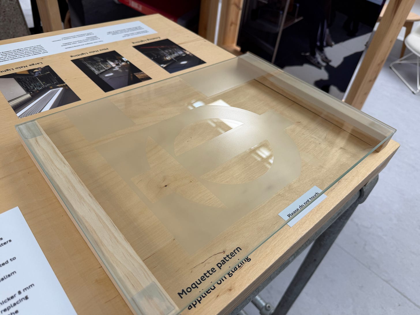 Photo showing moquette pattern etched onto glass sample. Photo showing moquette pattern etched onto glass sample.