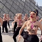Femen stages topless protest in Paris for International Women’s Day