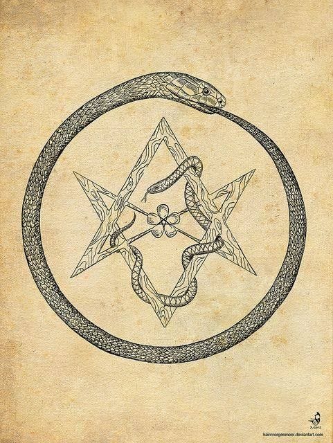 This may contain: a pen and ink drawing of a snake in a circle with two snakes on it