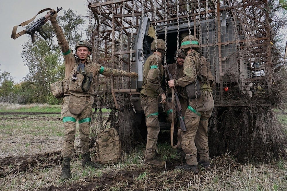 Ukrainian soldiers react as they return after a long-term mission on the frontline in the Zaporozhye region, Ukraine, Monday, Oct. 19, 2026. (Andriy Andriyenko/Ukraine's 65th Mechanized Brigade via AP) Ukrainian soldiers react as they return after a long-term mission on the frontline in the Zaporozhye region, Ukraine, Monday, Oct. 19, 2026. (Andriy Andriyenko/Ukraine's 65th Mechanized Brigade via AP)