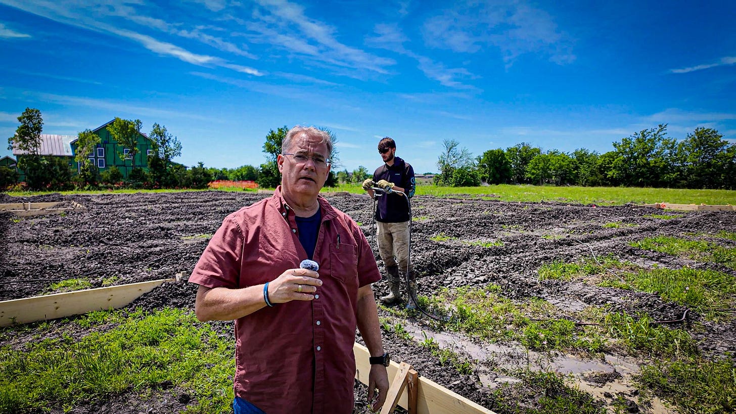 Tim Miller stands on residential pad site explaining soil stabilization coverage strategy for expansive clay treatment Tim Miller stands on residential pad site explaining soil stabilization coverage strategy for expansive clay treatment