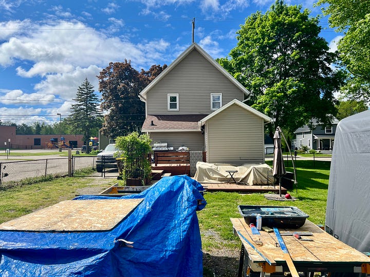 The Million Dollar Garage stands at the ready...a pile of purged trash ready to be removed...a semi studio set up outside ready to be used until the rebuild begins...the garden ready to be planted...and the patio ready to be used in the way patios are used during the Michgan summer