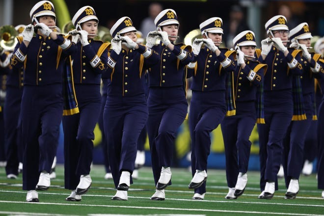 Dec 29, 2018; Arlington, TX, United States; Notre Dame Fighting Irish marching band performs before the 2018 Cotton Bowl college football playoff semifinal game against the Clemson Tigers at AT&T Stadium. Mandatory Credit: Matthew Emmons-USA TODAY Sports