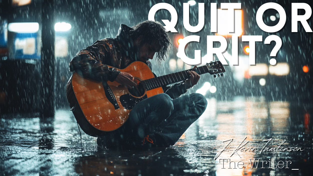 A guitarist sits on the ground, playing in the rain. Now that's dedication. 