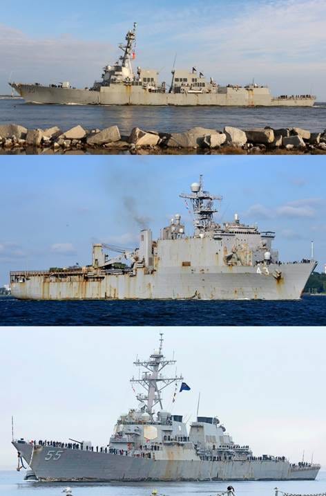 A group of ships in the water

AI-generated content may be incorrect.