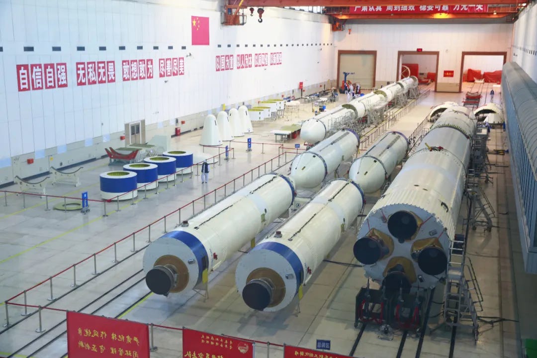 Hardware for Long March 3A series vehicles undergoing various stages of manufacturing.