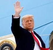 A person in a suit waving

AI-generated content may be incorrect.