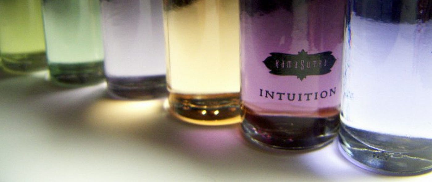 A row of vials containing coloured liquids, one with the inscription "Intuition" A row of vials containing coloured liquids, one with the inscription "Intuition"