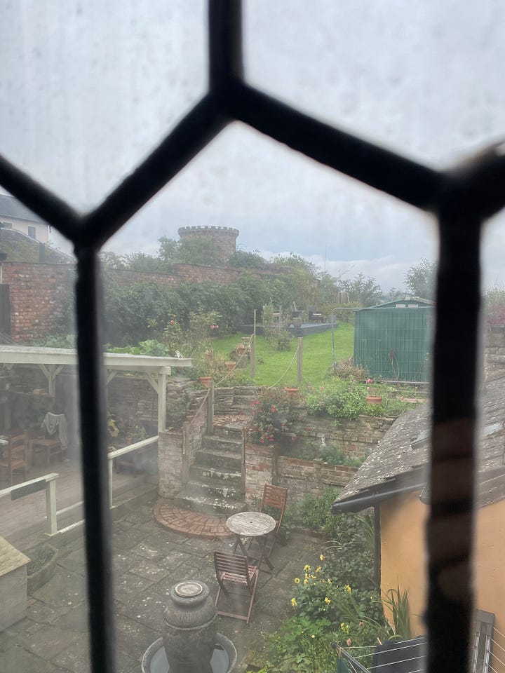 The sink in the room and view through the window