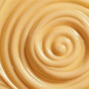 Close-up swirl of creamy facial moisturizer texture
