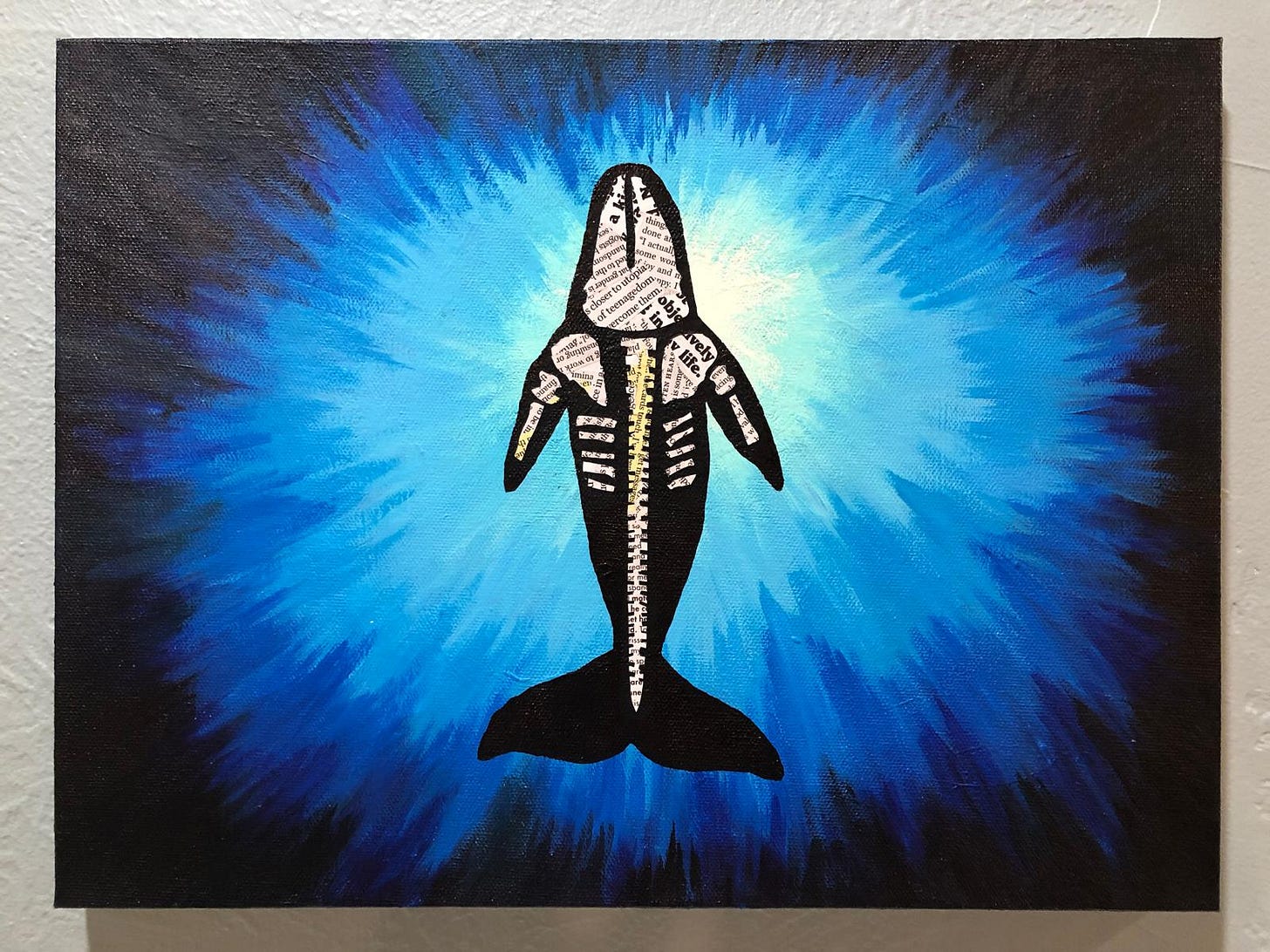 Emory’s painting, “Whale Fall,” of a whale silhouette as seen from below, with collaged materials forming a skeleton within the silhouette