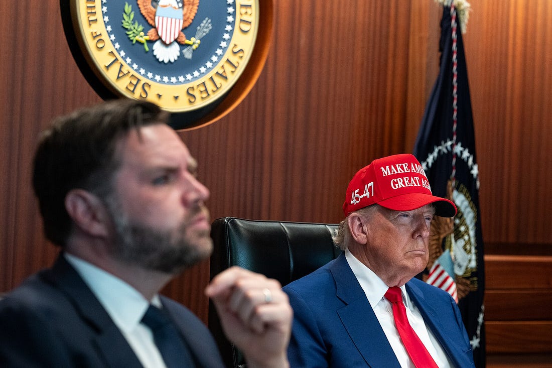 trump and vance sitting in situation room during iran strikes. Vance looks self consciously serious, with one hand raised towards chin. Trump has a MAGA hat and looks like he is decaying. trump and vance sitting in situation room during iran strikes. Vance looks self consciously serious, with one hand raised towards chin. Trump has a MAGA hat and looks like he is decaying.