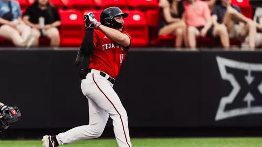 Logan Hughes swings a bat during a game at Rip Griffin Park Logan Hughes swings a bat during a game at Rip Griffin Park