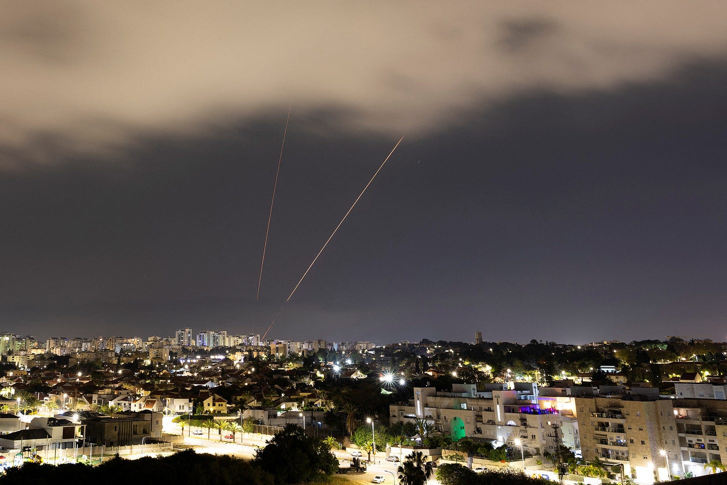 An antimissile system operates after Iran launched drones and missiles toward Israel as seen from Ashkelon.