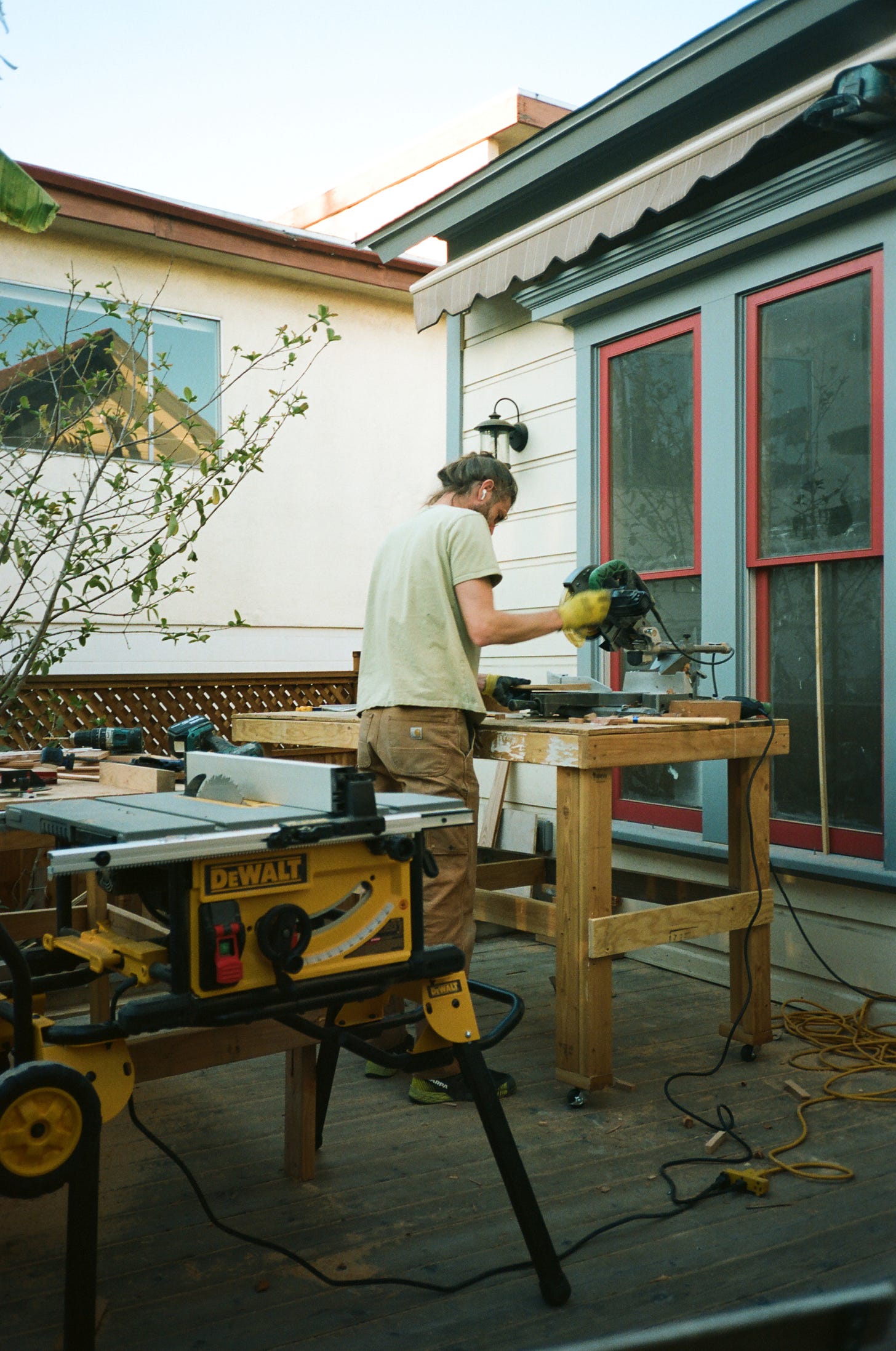 Grayson Revoir at work on Baby Bistro's patio