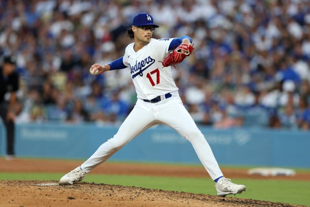 Joe Kelly of the Los Angeles Dodgers pitches during the game against the Cincinnati Reds at Dodger Stadium on July 29, 2023 in Los Angeles,...