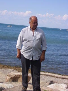 In the first image my sister Abigail, Annabelle, and I are posed on Centre Island with the Toronto skyline circa 2005 is in the background. The second photo is of the old Maple Leaf Gardens, and the final photo is of a upper middle aged balding man, my father.