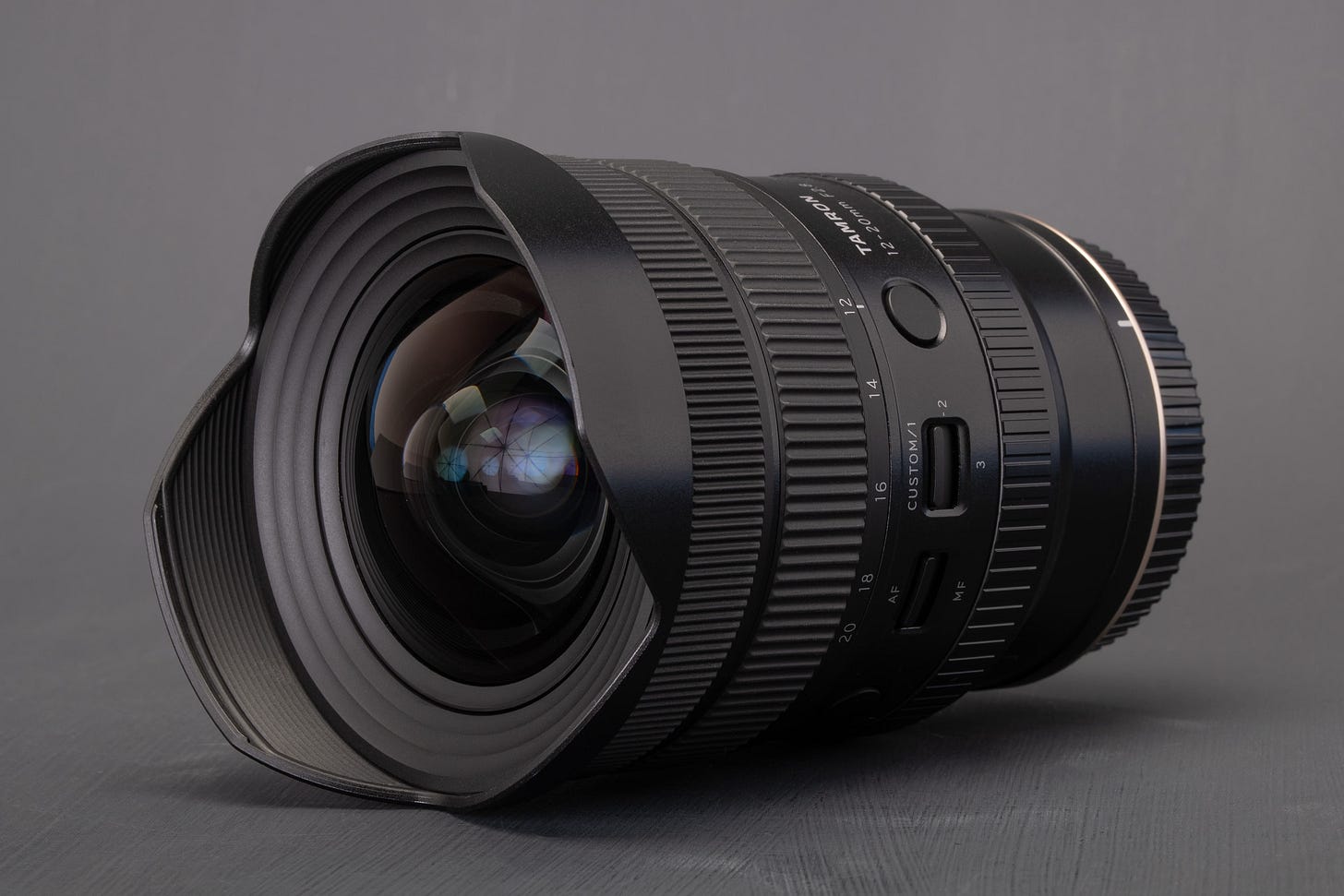 Lente Tamron, a marca domina o mercado de lentes genéricas Lente Tamron, a marca domina o mercado de lentes genéricas