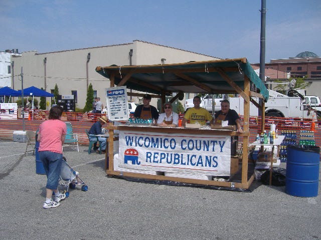 I actually took this picture of the Wicomico County Republican Club food booth just after they opened at 10 a.m. The lady was the first of many satisfied customers. I actually took this picture of the Wicomico County Republican Club food booth just after they opened at 10 a.m. The lady was the first of many satisfied customers.