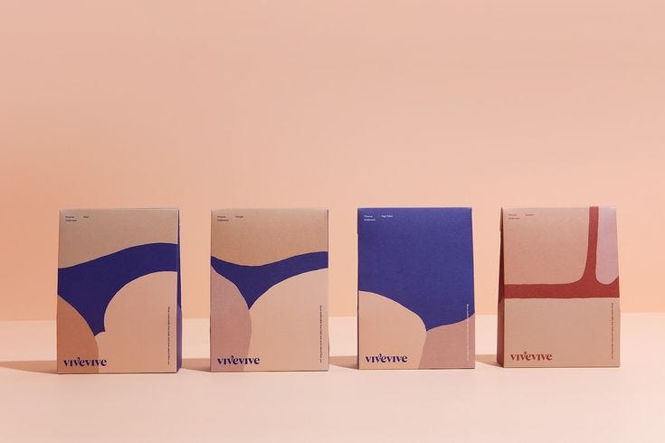 This may contain: three boxes with different designs on them sitting in front of a pink background and two are empty