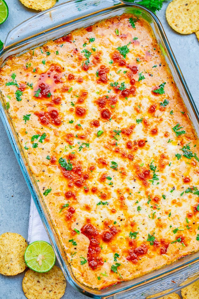 Cheesy Baked Mexican Corn Dip — A hot corn dip reminiscent of Mexican street corn!! Creamy, cheesy, spiked with lime juice, chili powder, and a serrano chile or jalapeno for a touch of heat! SO EASY and ready in 20 minutes!! Perfect for parties, potlucks, tailgating, or your next FIESTA!! Cheesy Baked Mexican Corn Dip — A hot corn dip reminiscent of Mexican street corn!! Creamy, cheesy, spiked with lime juice, chili powder, and a serrano chile or jalapeno for a touch of heat! SO EASY and ready in 20 minutes!! Perfect for parties, potlucks, tailgating, or your next FIESTA!!