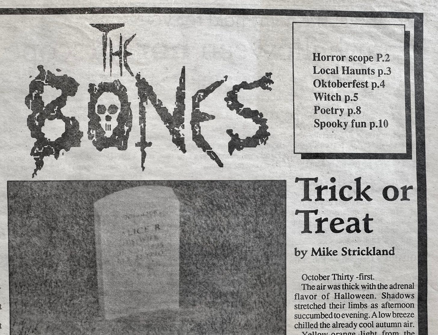 Detail view of the front page of a newspaper, showing the masthead title "The Bones" and the first paragraph of a story in the righthand column headed "Trick or Treat," by Mike Strickland