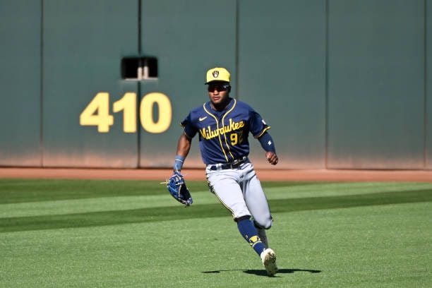 Braylon Payne of the Milwaukee Brewers fields a ground ball during the fifth inning of a spring training game against the Cleveland Guardians at...