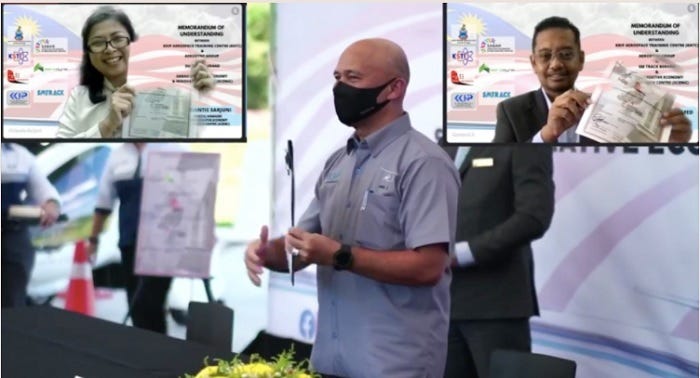 SCENIC GM Viviantie Sarjuni, KATC CEO Aminuddin Zakaria and Aerodyne Founder and Group CEO Kamarul A Muhamed signing a MoU to provide Sabah people with job opportunities in Drone Tech, Data Tech, and Digital Transformation.