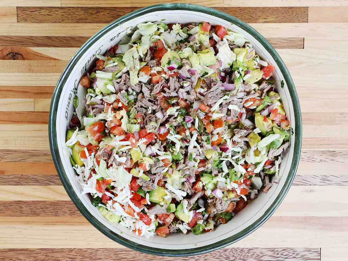 a bowl of salpicón a Mexican shredded beef salad